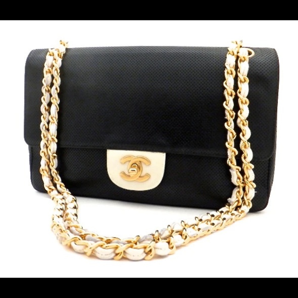 Authentic Chanel Perforated Black & White 2.55  Flap bag